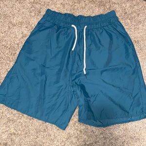 Blue athletic shorts. Size medium.